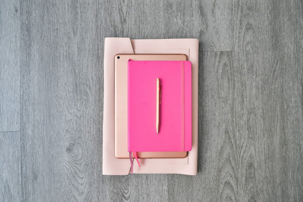 white and pink box on white textile