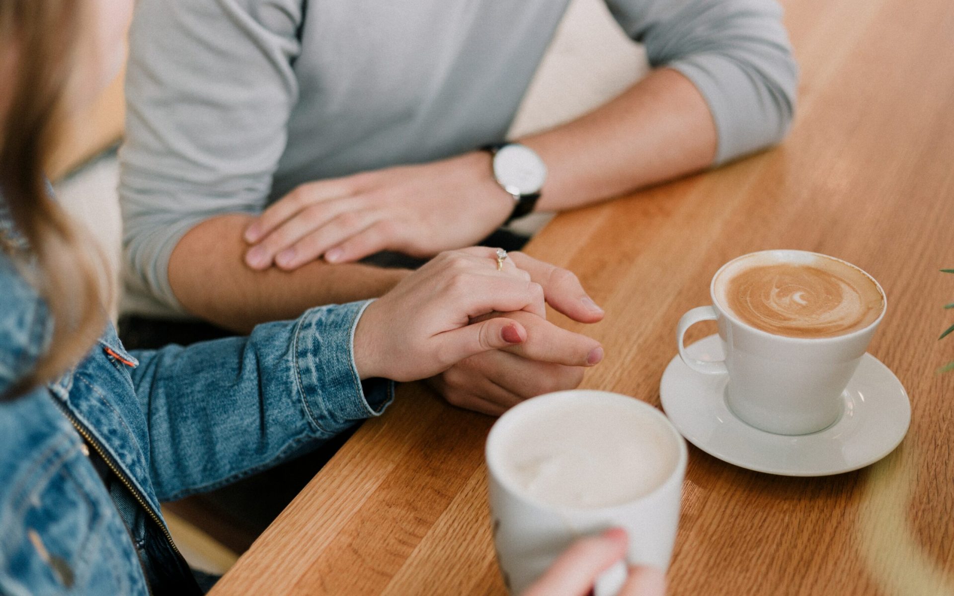 man and woman holding hands